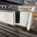 海天5米龙门，工作台3米5米，门宽3.65米，门高1.57米.